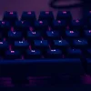 purple backlit mechanical keyboard as